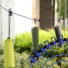 Load image into Gallery viewer, Portable Elastic Travel Clothes Rack
