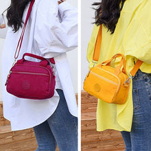 Load image into Gallery viewer, Functional Multi-Compartment Solid Color Handbag
